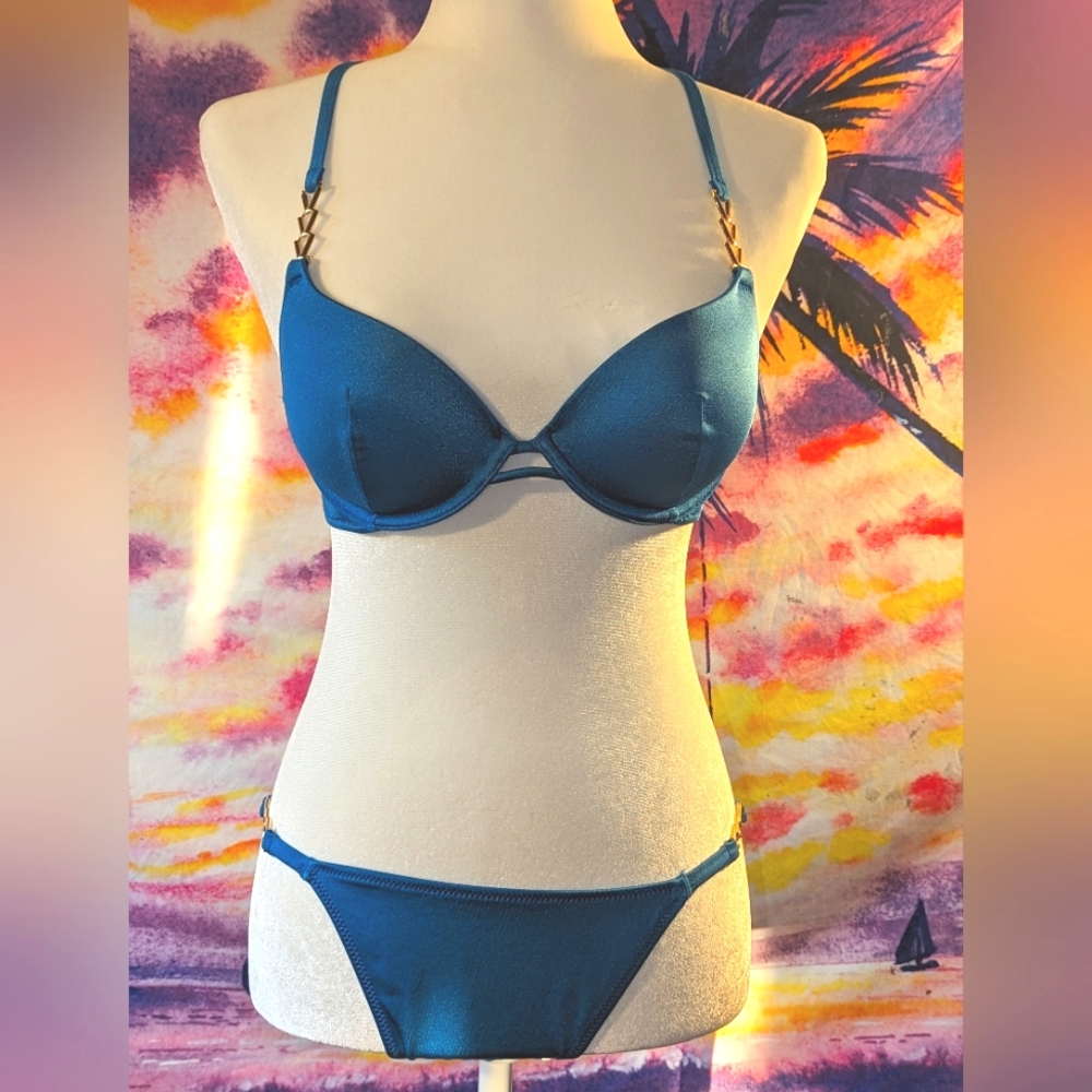 Victoria's Secret Bikini NWOT. Never used. Size S/M bottoms, 34B top